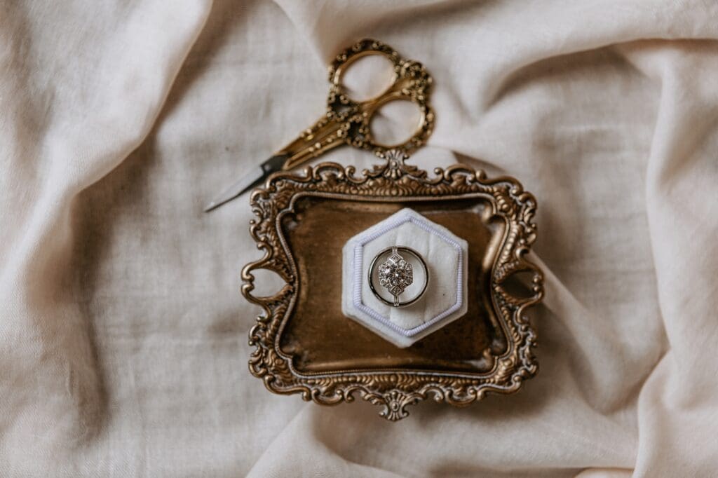 wedding ring on vintage gold tray