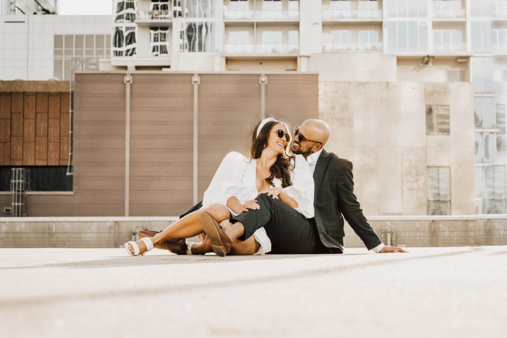 Couple during their parking garage engagement in downtown charlotte