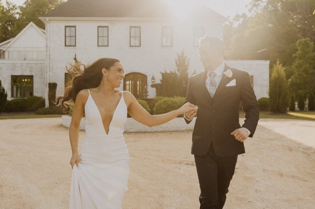 Couple just married, playing in the sun.