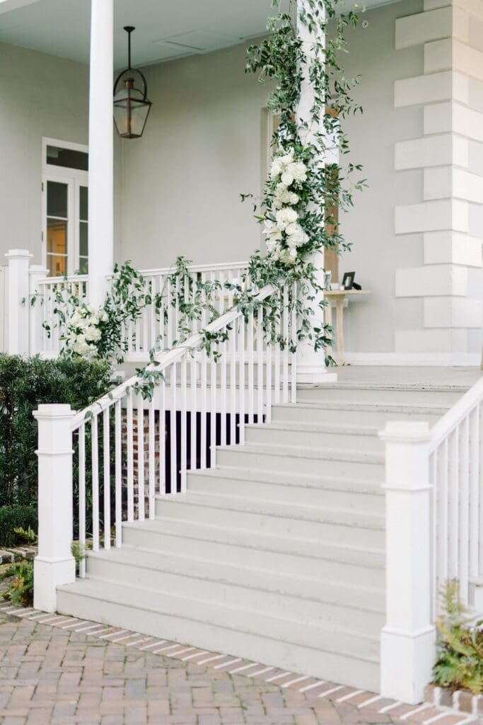 Beautiful florals wrapped up the hand rails at this wedding.