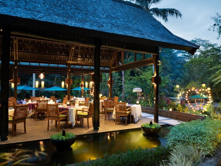 Romantic dinner location outside under a covered pavilion in Bali