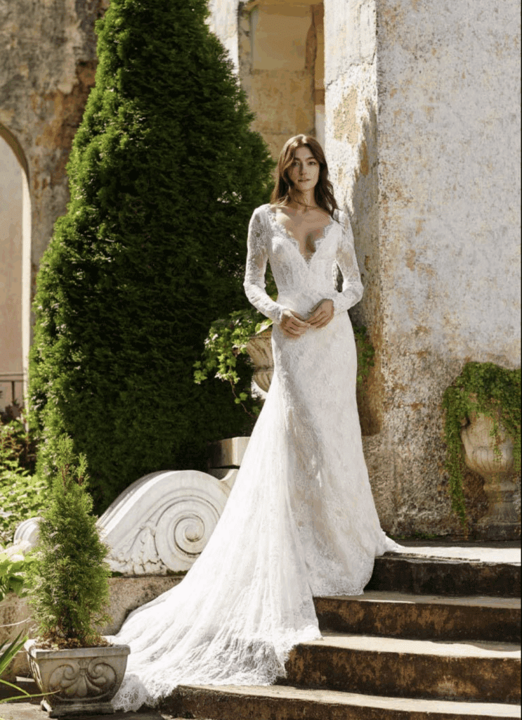 Model displaying beautiful and classic wedding gown.
