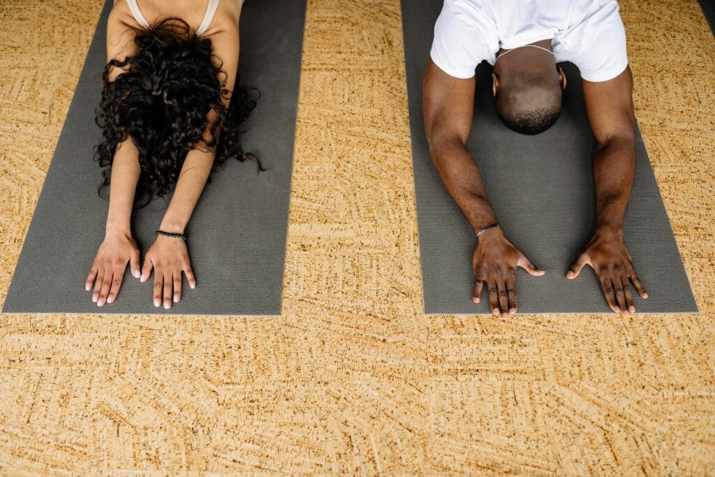 Couple doing yoga together in Bali